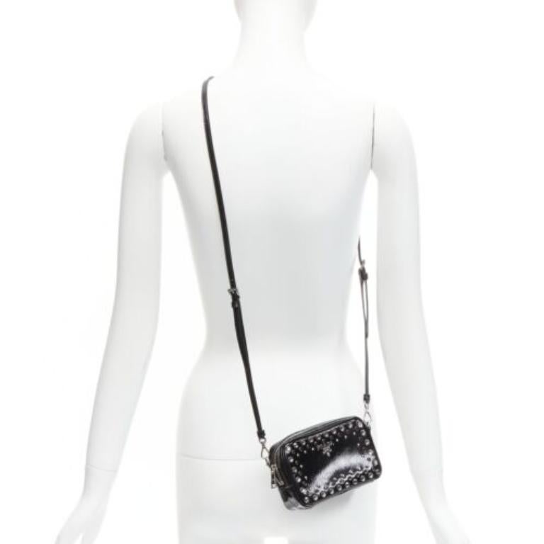 PRADA crystal silver stud logo black saffiano leather crossbody camera bag
Reference: TGAS/D00674
Brand: Prada
Designer: Miuccia Prada
Material: Leather
Color: Black, Silver
Pattern: Solid
Closure: Zip
Lining: Black Fabric
Extra Details: Signature