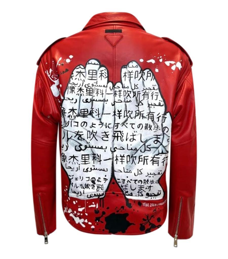 Prada Custom Painted Leather & Mink Fur Biker Jacket
Oversized, uber soft bright red leather jacket with custom sheared mink fur lining in contrasting black.
Custom hand painted design two palms of hands and splash splatters of paint.
Belted hem,