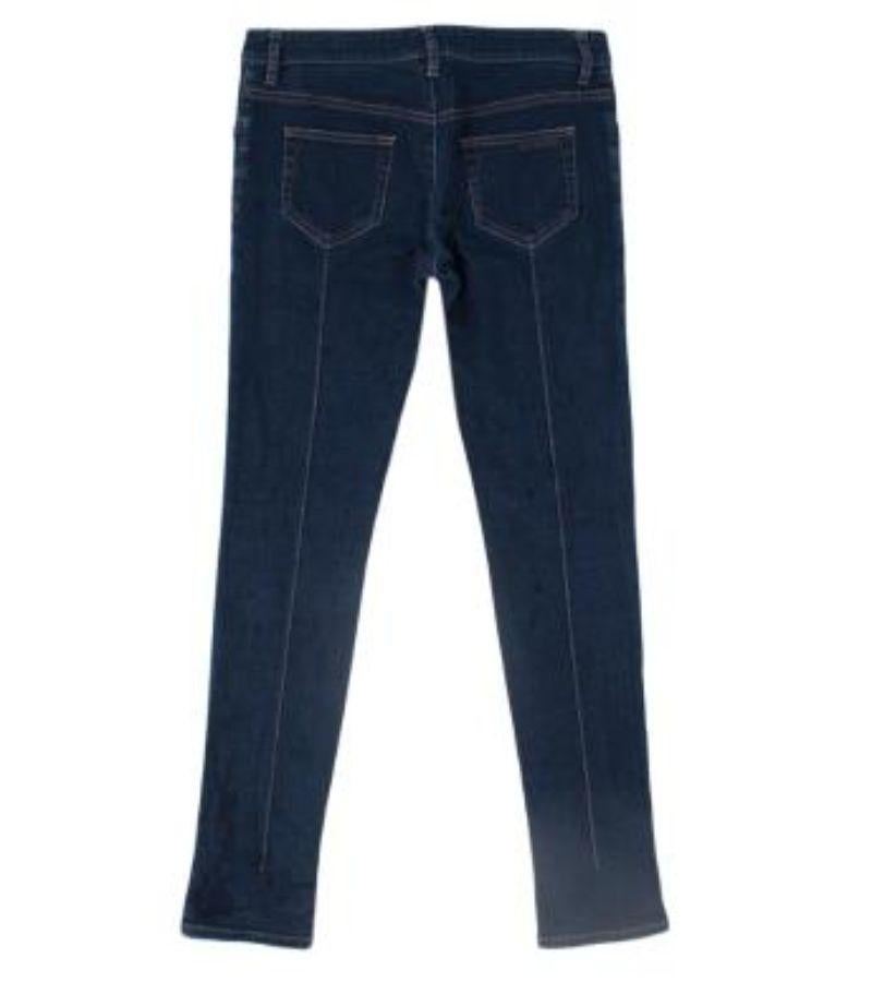 Prada - Dark Blue Skinny Jeans 

- zip and hook fastening on the front - belt loops - 5 pockets - contrast orange stitching - low waist

Please note, these items are pre-owned and may show signs of being stored even when unworn and unused. This is
