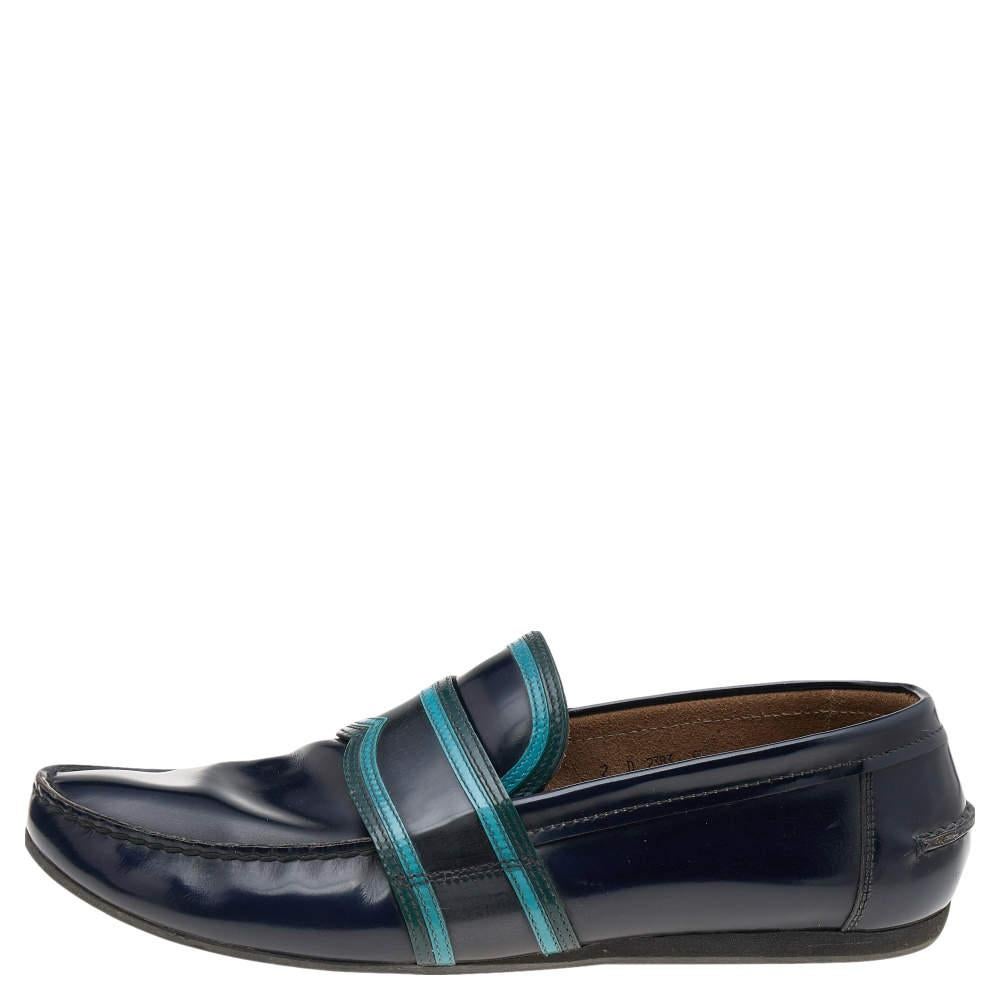 Stylish and super comfortable this pair of loafers by Prada will make a great addition to your shoe collection. The shoes have been crafted from leather and styled with contrasting trims. Leather insoles and rubber outsoles beautifully complete the