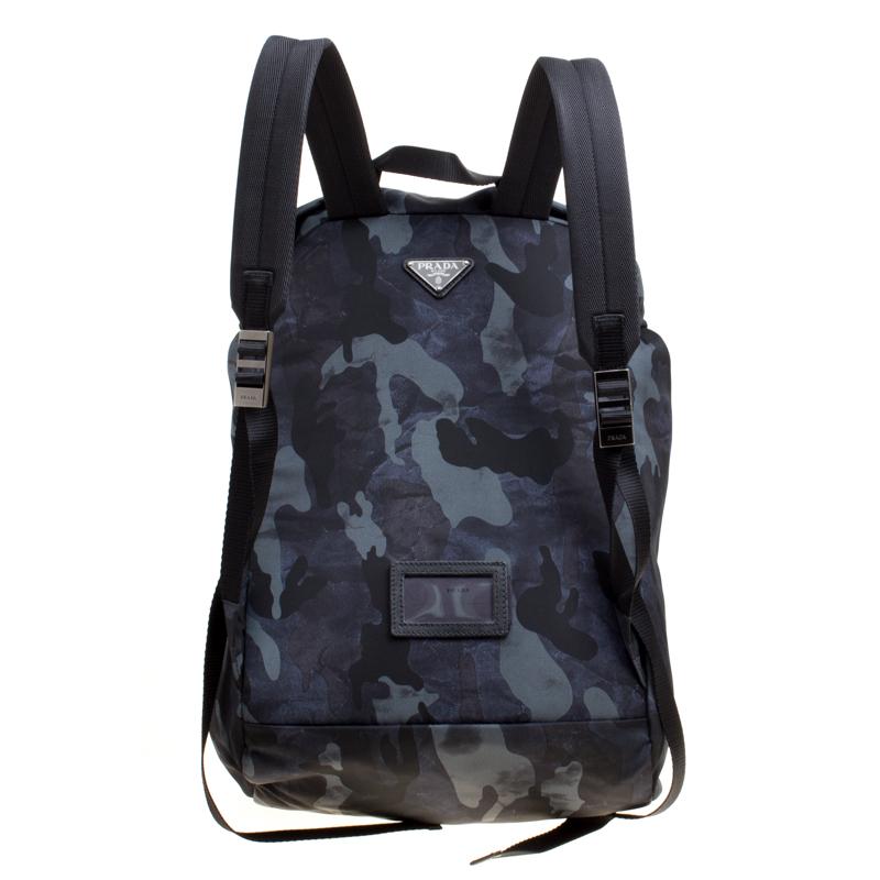 We love anything Prada, and currently, this backpack has left us smitten! This backpack boasts of fabulous style and outstanding details. It is crafted from smooth nylon and is adorned with a camouflage print all over, and two zipped front pockets