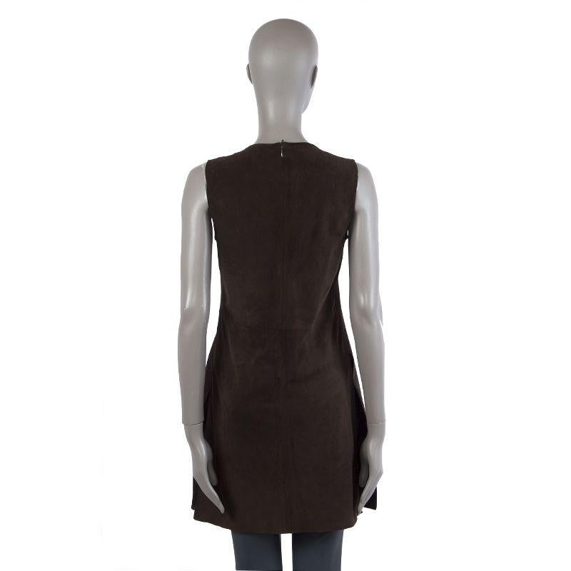 Prada sleeveless knee-length tunic dress in dark brown goat skin suede (100%). Opens with zipper in the back with leg slits on the sides. Has been worn and is in excellent condition.

Tag Size 40
Size S
Shoulder Width 35cm (13.7in)
Bust From 93cm