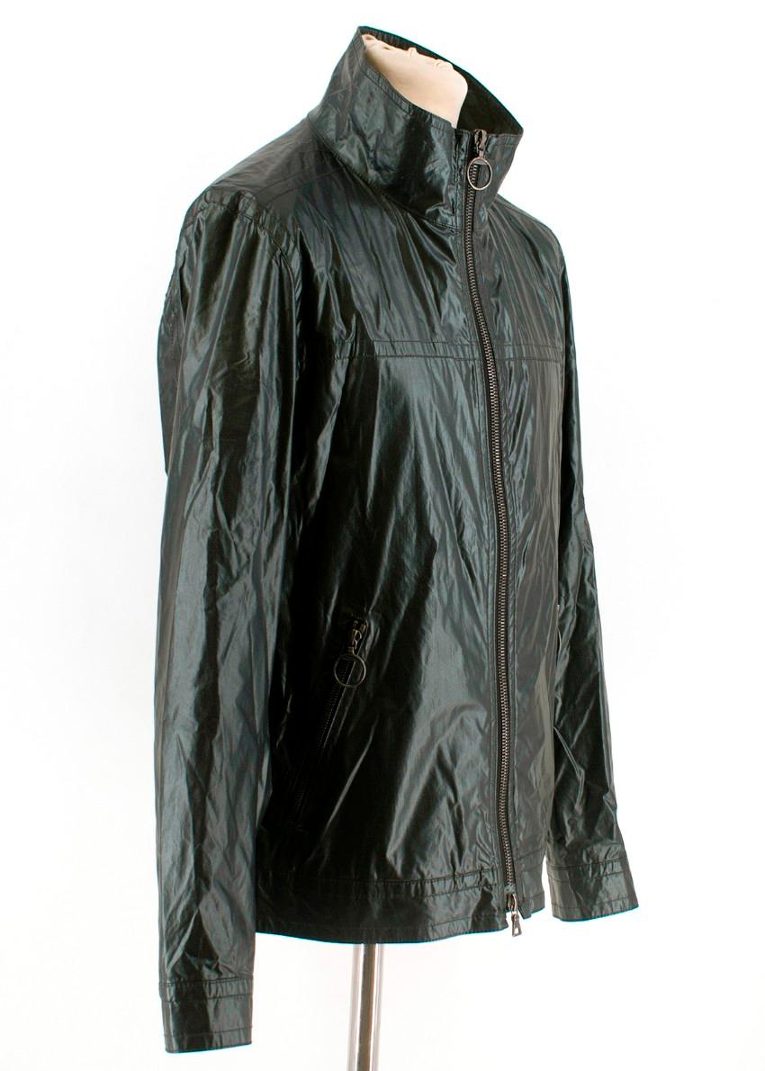 Prada Dark Green Waxed Jacket.


- Size Medium
- Zips in front
- Loose fitting
- Lightweight
- Waterproof 
- 2 zipped pockets
- 70% cotton, 25% Polyurethane, 5% Acrylic
- Made in Italy

Shoulders: 44 cm
Sleeves: 64 cm
Chest: 39 cm
Waist: 48