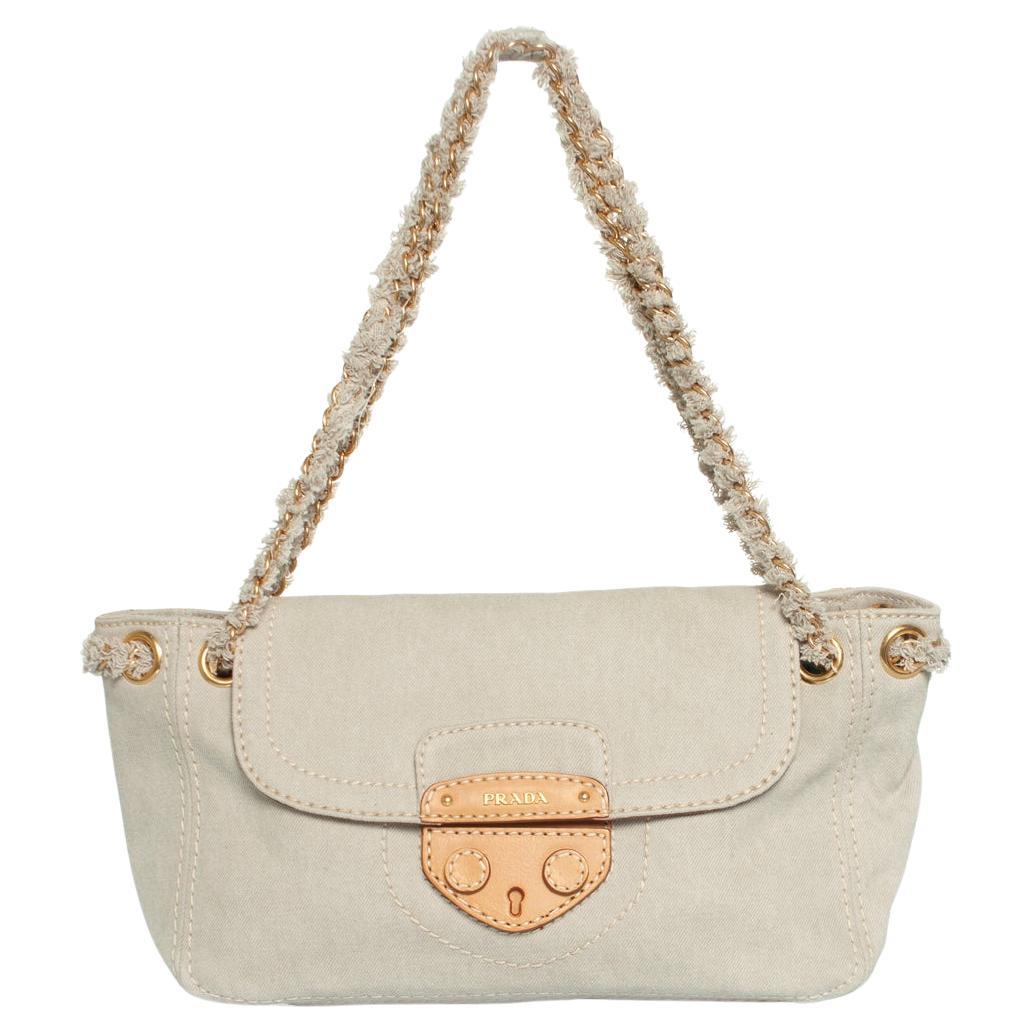 Prada, denim shoulder bag in beige For Sale