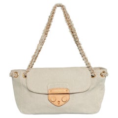 Prada, denim shoulder bag in beige