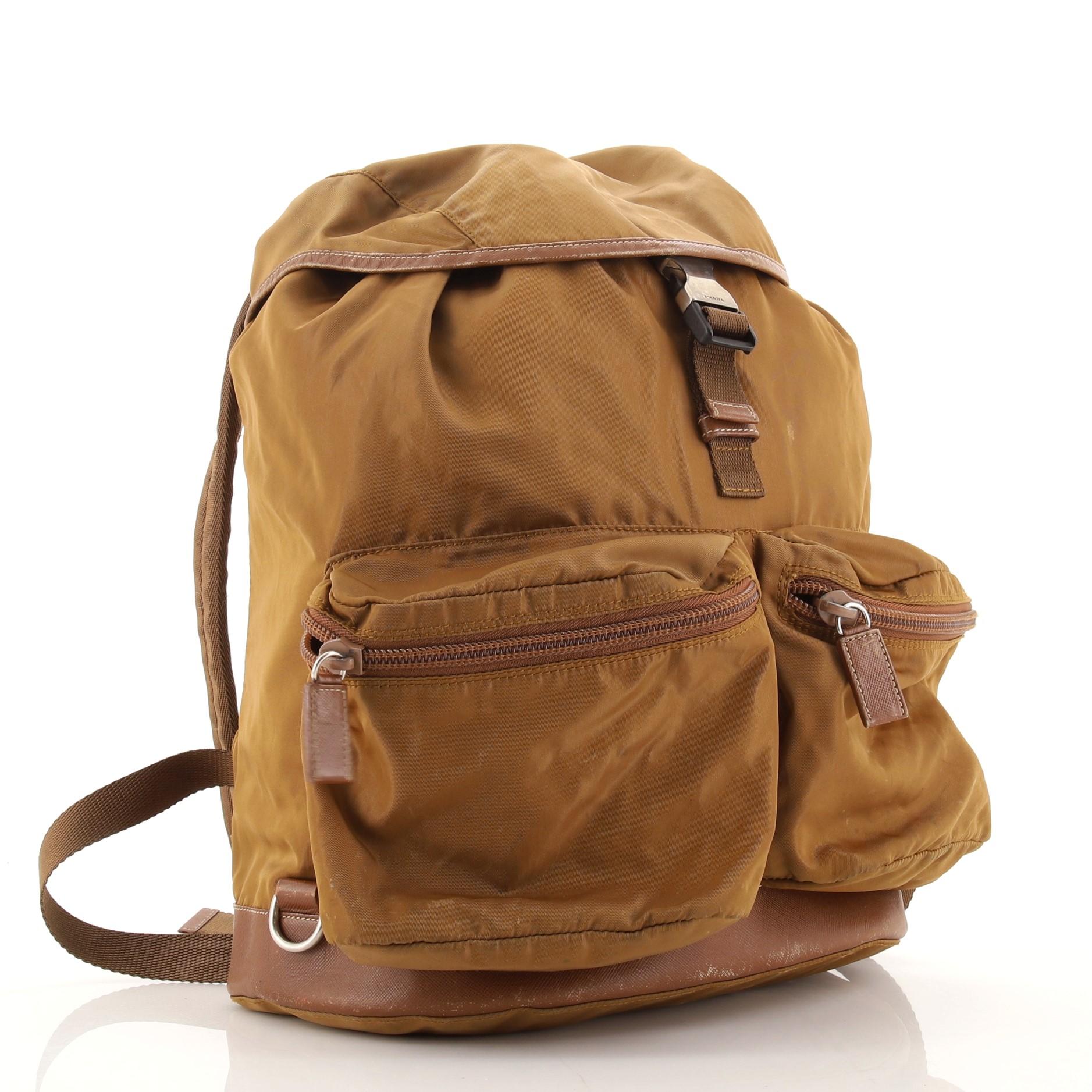 Estimated Retail Price: $1,100
Condition: Good. Odor in interior. Wear and marks on exterior, peeling on leather trims. Pilling on drawstring and straps, scratches and discoloration on hardware.
Accessories: No Accessories
Measurements: Handle Drop
