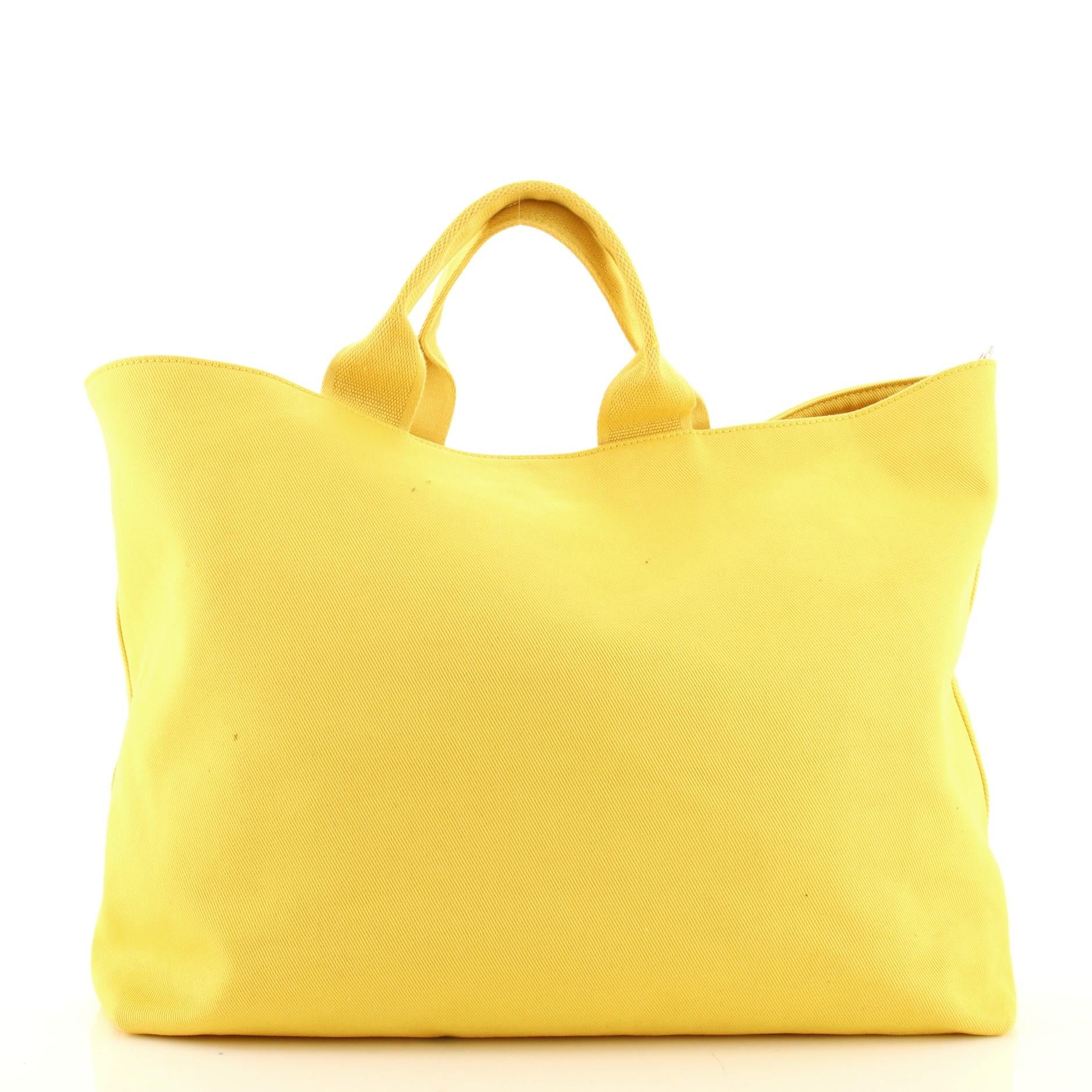 prada embossed logo bag