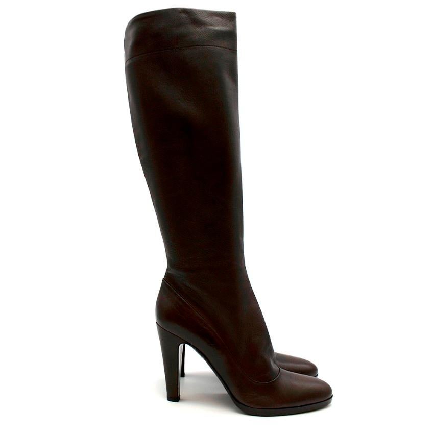 Prada Espresso Leather Heeled Knee-Length Boots

- Soft brown leather 
- Knee-length
- Mid heel 
- Almond toe
- Inner zip fastening 
- Burgundy leather linning

Materials:
Main - 100% Leather 
Sole - 100% Leather 
Lining - 100% Leather

Made in