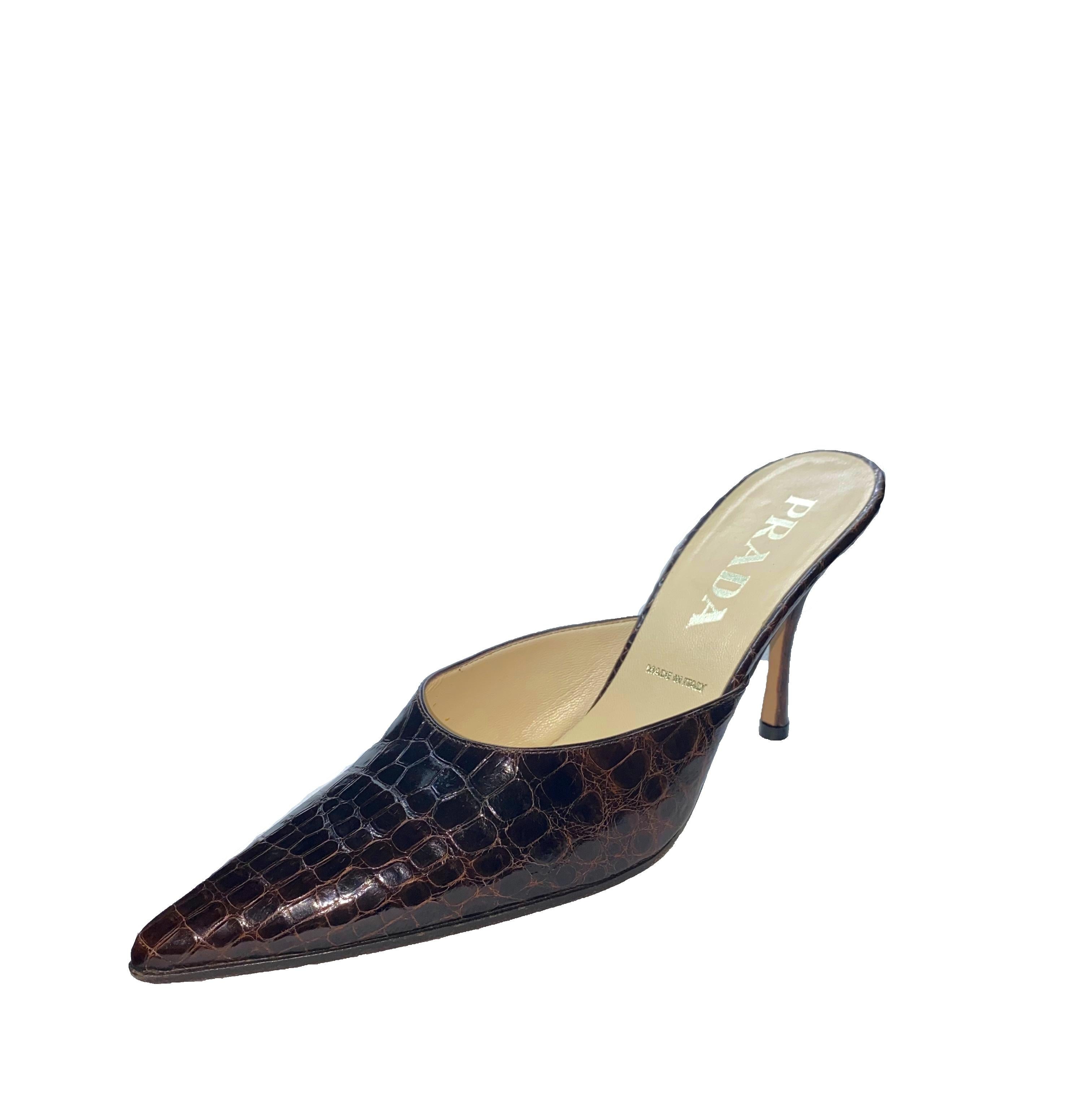 Beautiful Prada High Heel  Mules
Real  alligator skin in beautiful chocolate brown color - no print
From Prada's exotic skin collection
Classic style
Made in Italy
Size 36.5 EU
Comes with Prada dustbag
Retailed for 3299$ plus taxes
