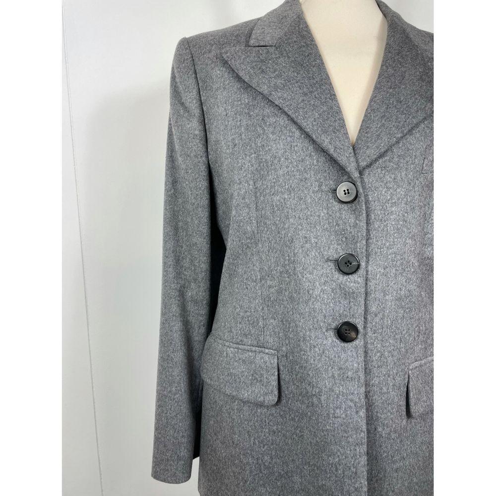 Prada Exotic Leathers Blazer in Grey

Prada jacket. Very special and fine camel fabric. size label is missing but wears a 42 \ 44 size. Measures 44cm shoulders, 47cm bust, 78cm long, 64cm sleeves. Excellent condition, no defects to report. Very