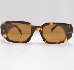 Prada Eyewear Schildpatt Sonnenbrille mit quadratischem Rahmen