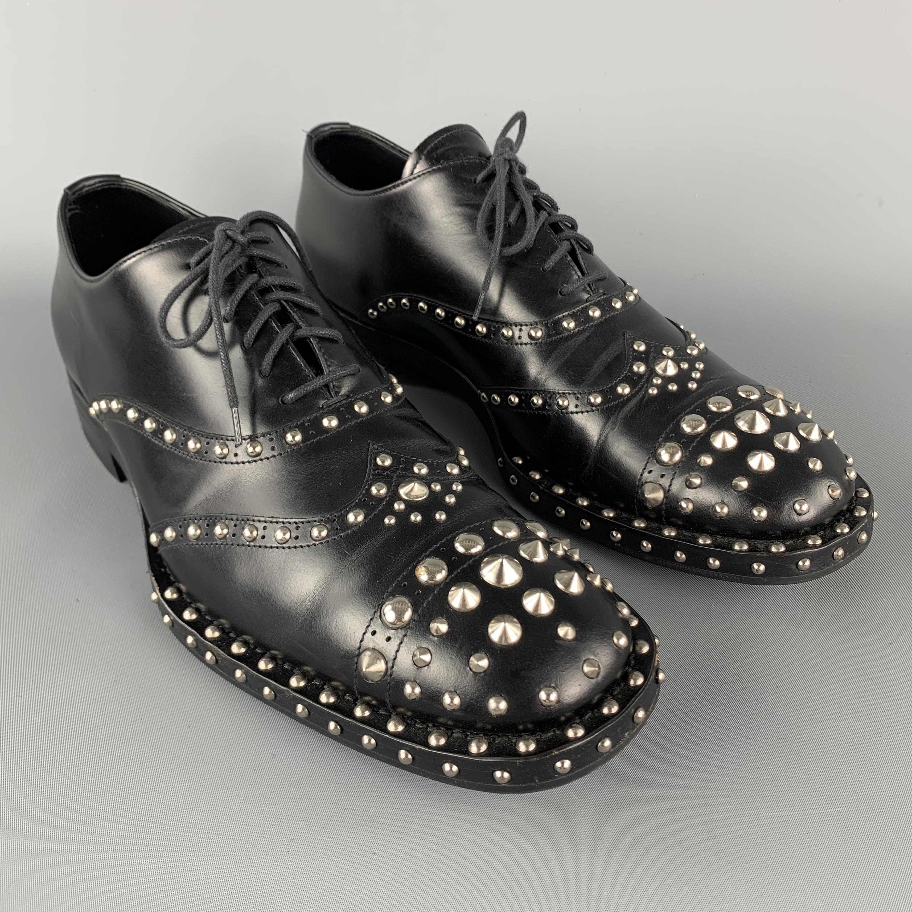 PRADA Fall / Winter 09 Lace Up Shoes comes in a solid black leather material, featuring studs, and a cap toe. Made in Italy.

Excellent Pre-Owned Condition.
Marked: 45

Outsole: 12.5 x 4.5 in.
