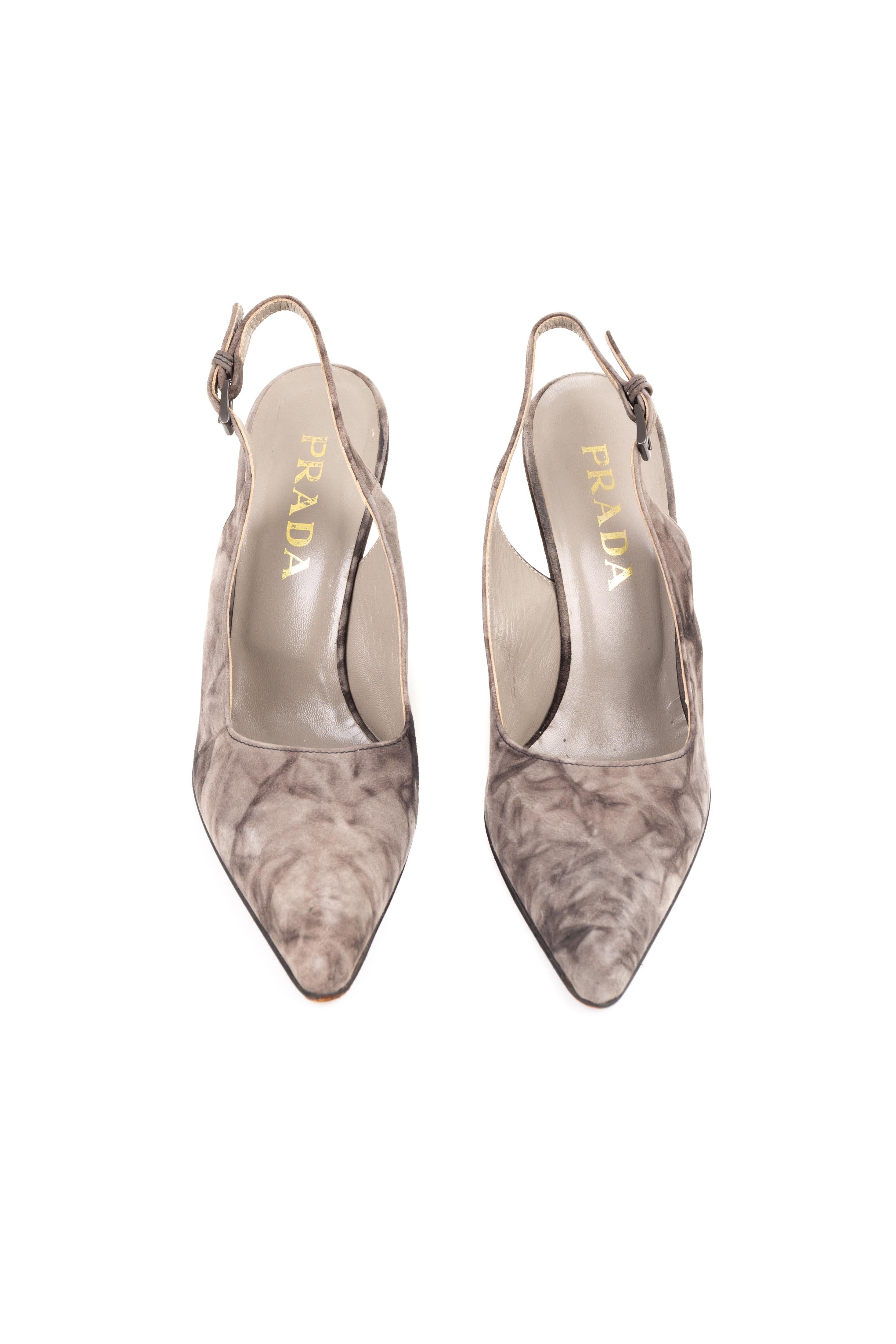 - Prada by Miuccia Prada
- Sold by Gold Palms Vintage
- Fall Winter 1997 collection
- Grey suede wedge heels
- Marble effect motif
- Size: 37,5 / US 7 / UK 5