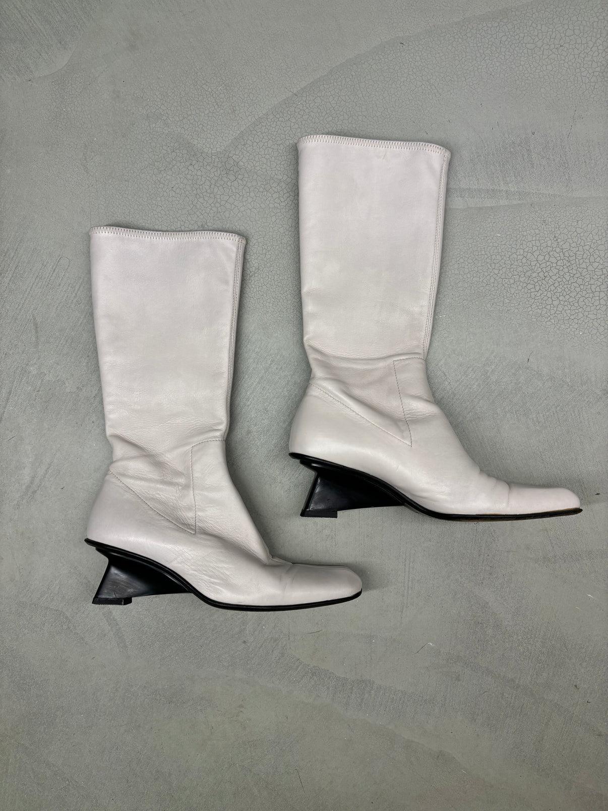 - Prada by Miuccia Prada
- Gold Palms Vintage
- Fall Winter 1998 Collection
- Light grey leather boots 
- Sculptural wedge heels
- Size: EU 37