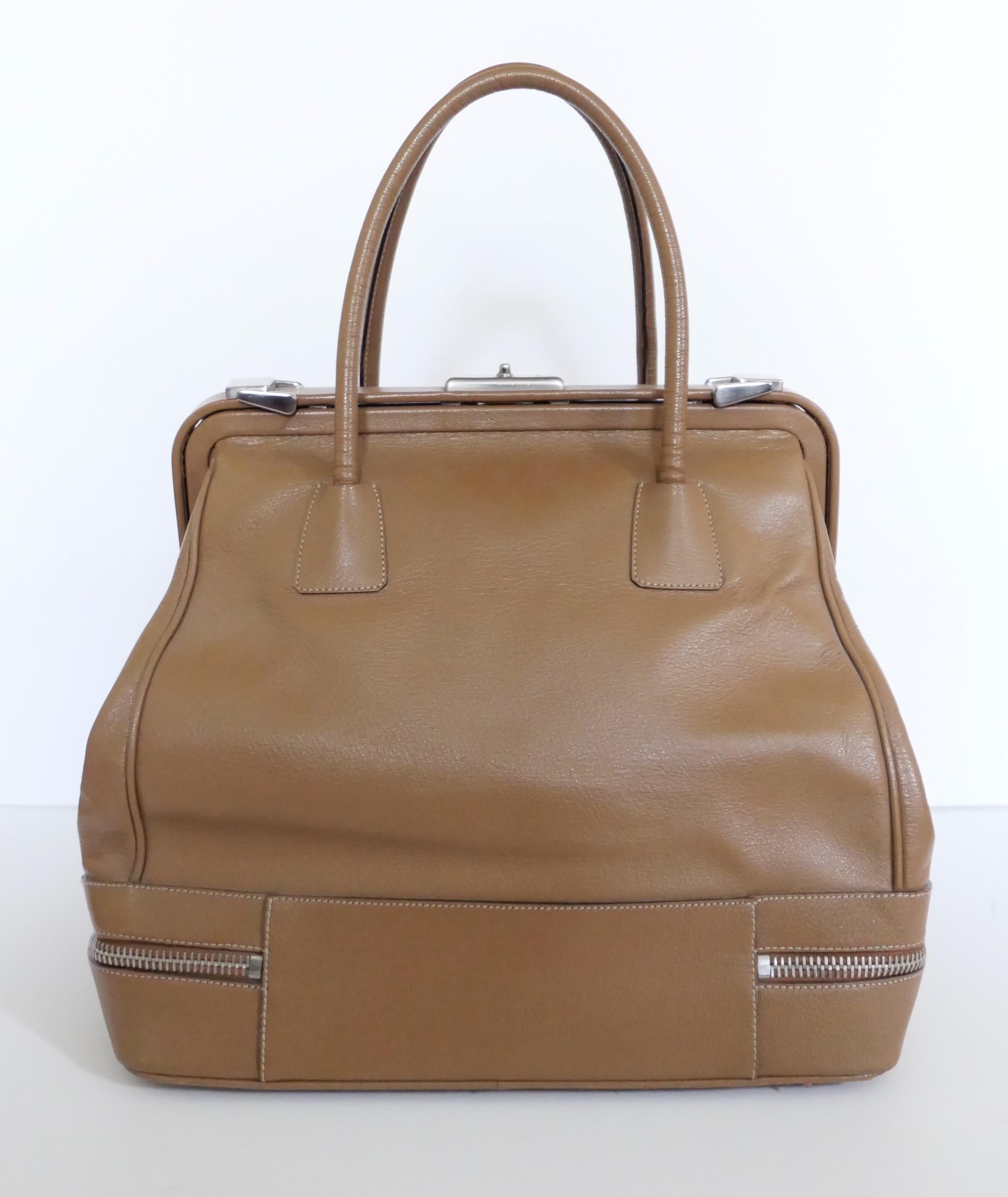Incredibly rare Prada doctor’s bag from the AW00 collection - look 34 on the runway. In amazing worn once, vintage condition with dustbag. This is an absolute grail piece for Prada collectors - I have never seen one of these for sale before and