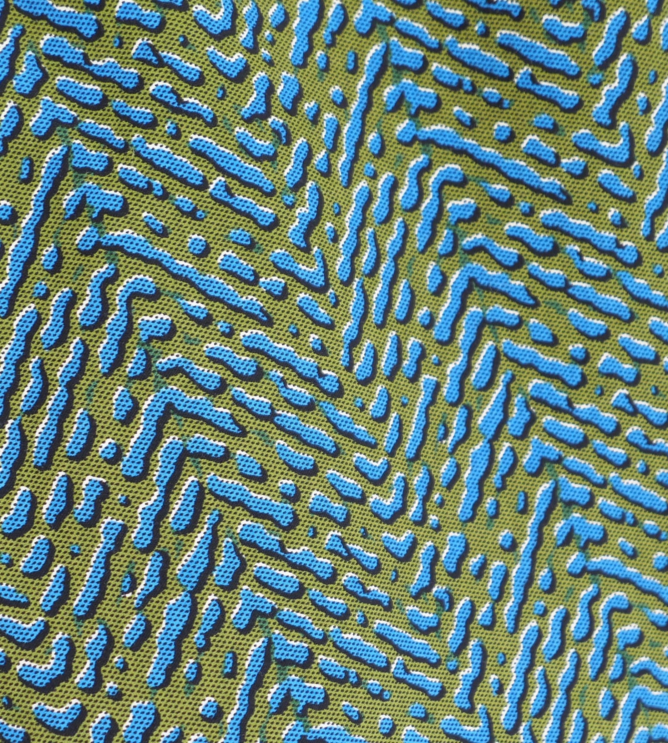 Fabulous Prada skirt from the Fall 2015 collection - Look 17 on the runway. Unworn. I have the matching jacket listed also. Made from thick wool twill with the collection’s iconic abstracted water droplet print in olive green and blue. It has a