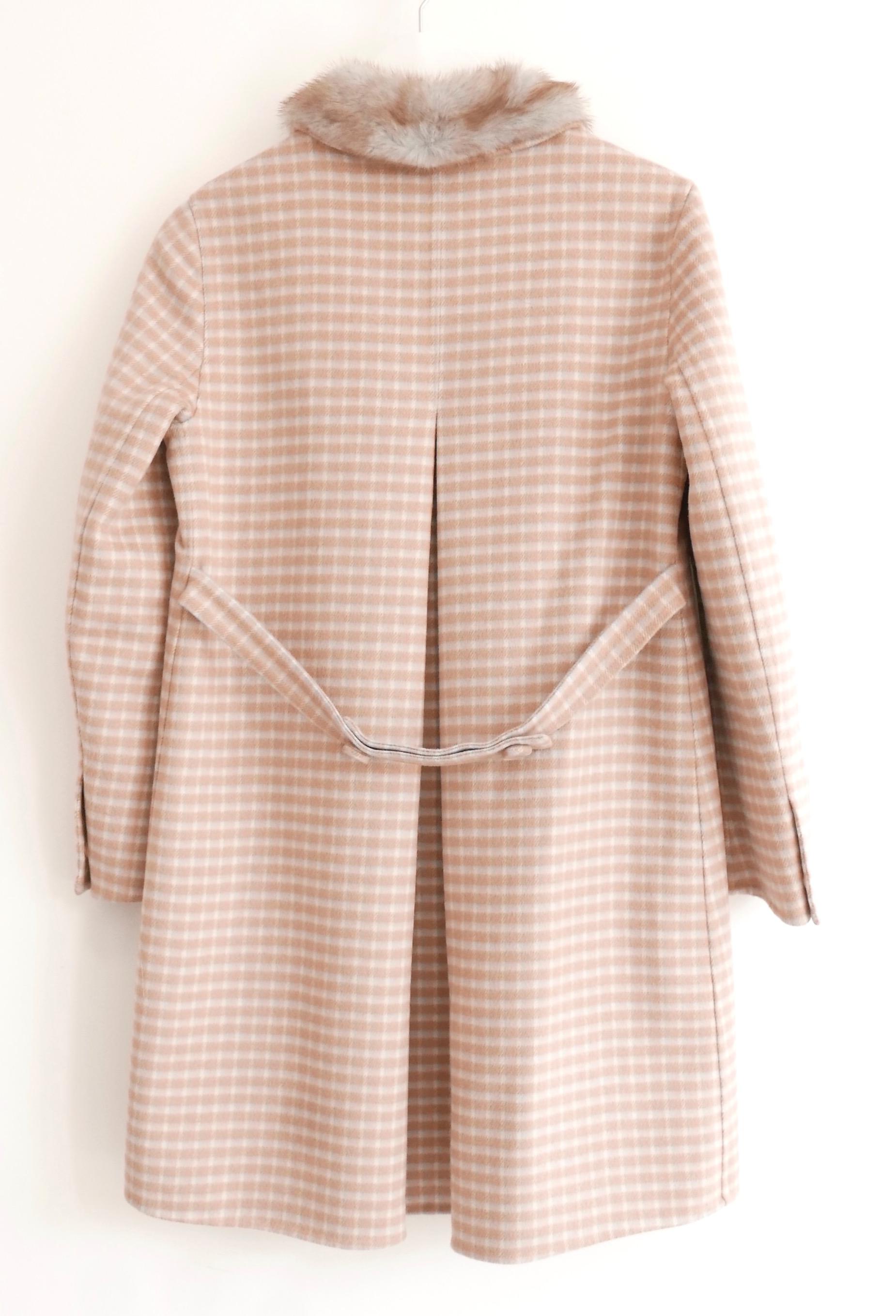 Absolutely divine Prada coat from the Fall 2015 Collection. bought for £4000 and worn once - some with spare button. Made from ultra soft camel, pale blue and white check virgin wool 
with a grey/brown mink fur collar. Has a gorgeously feminine,