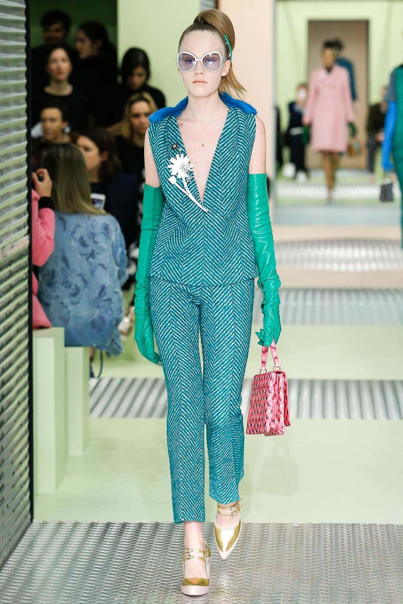 Prada Fall 2015 Runway Green Tweed Sleeveless Top with Blue Mink Trim.  1960's inspired design sleeveless top with v-neckline and straight cut body.  Green and teal chevron striped boucle wool material.  Dyed blue mink fur at back neckline.  Marked