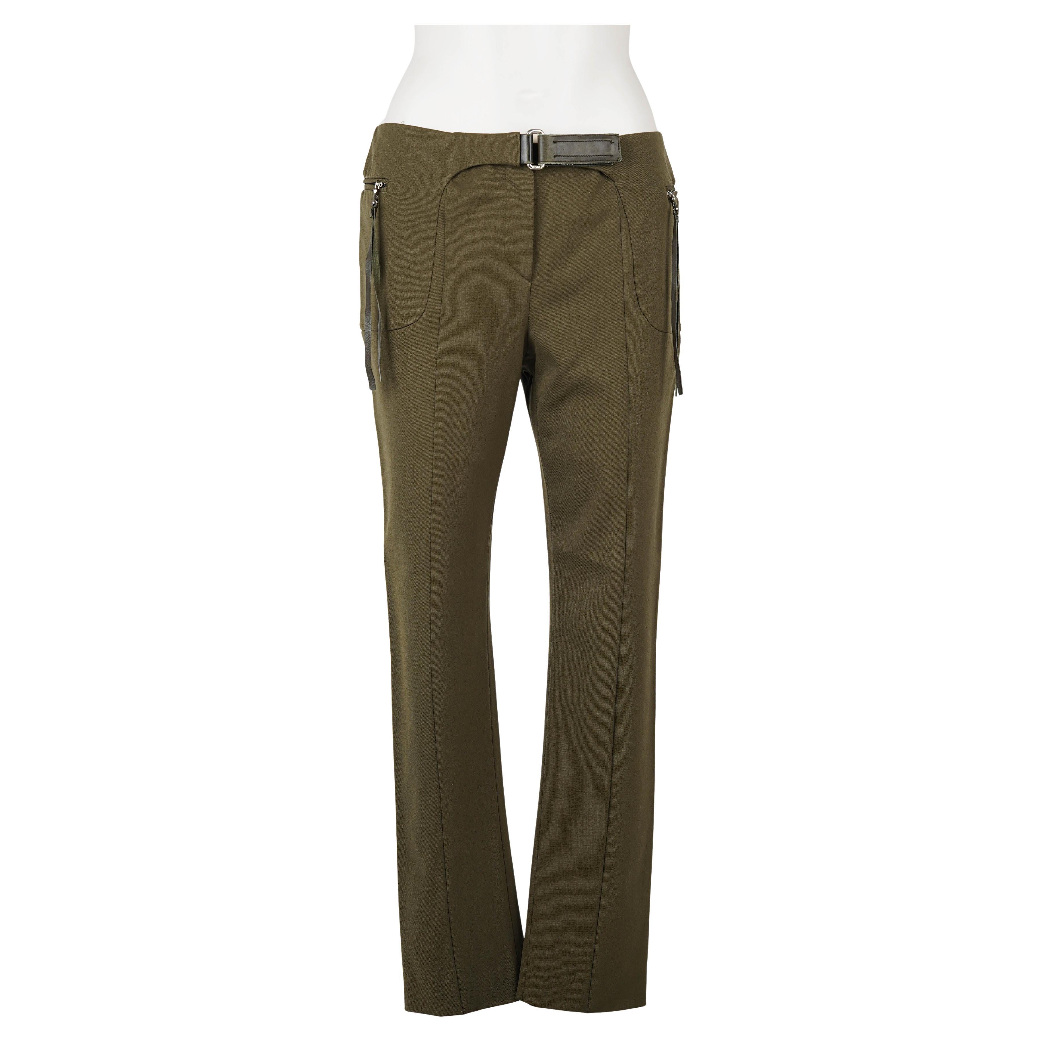 Exceptional and hard-to-find pair of trousers from Prada’s iconic Fall/Winter 1999 collection — one of the most sought-after seasons of Miuccia’s minimalist era. Produced in Italy in a dense, structured wool-blend gabardine, they’re cut in a clean