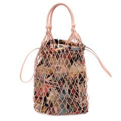 Prada Faux leather mesh and nylon bucket bag with Comic Print Slip Bag