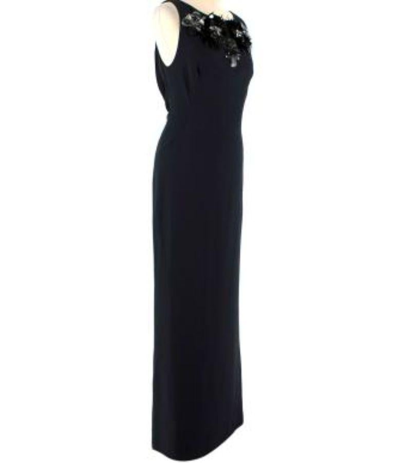 Prada Floral Embellished V-Cut Back Grown

- Beautiful floral embellishments around the neckline
- Black straight gown
- V-cut back 
- Side zipper

Material:
This item does not have a care label, but we believe it to be satin blend.

Made in