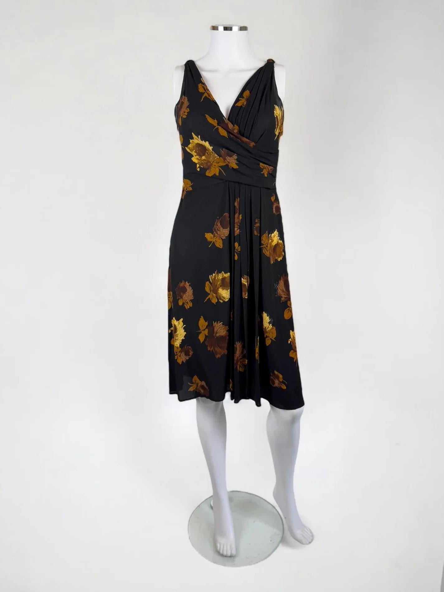 Prada black silk dress with brown floral print all over, Fall Winter 2005
This print appeared throughout the runway in several colour ways
Back zip 
Silk chiffon
Unlined
92% silk 8% elastane
Size: IT 44