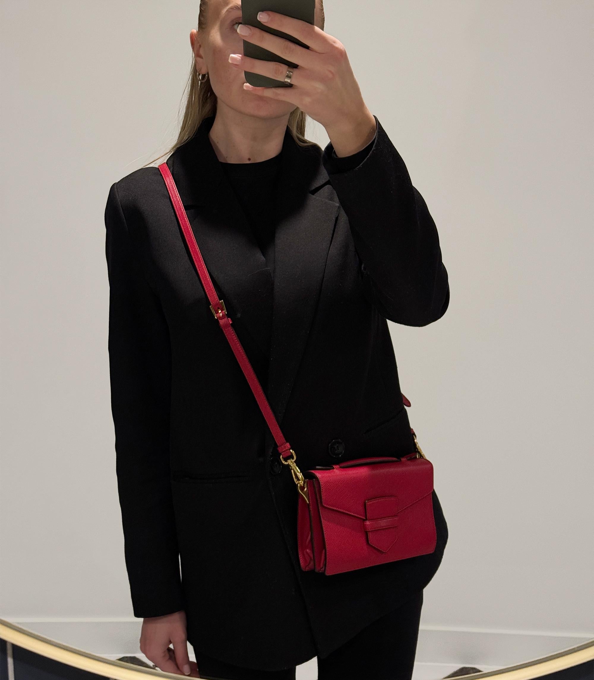 Prada Fuoco Saffiano Leather Cuir Top Handle Bag

Product Details
Xupes Ref: CB1442
Brand: Prada
Model:  Cuir Top Handle Bag
Type: Shoulder, Crossbody, Top Handle 
Serial Number: 31
Accompanied By: Prada Dust Bag, Authenticity Card, Care Booklet,