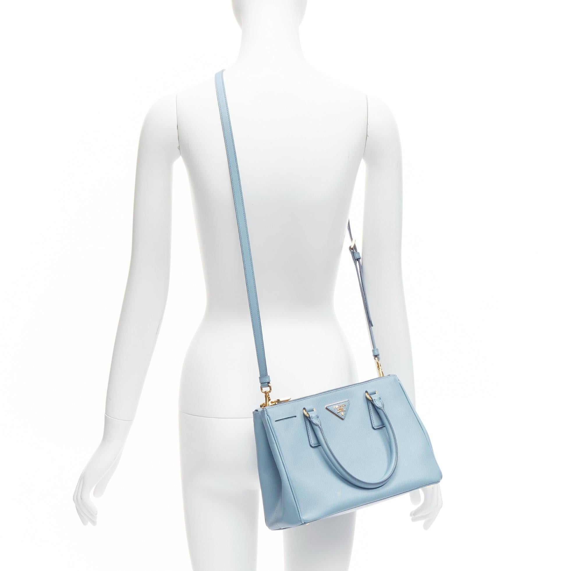 PRADA Galleria light blue saffiano leather triangle logo shoulder tote bag
Reference: CELE/A00015
Brand: Prada
Designer: Miuccia Prada
Model: Galleria
Material: Leather
Color: Blue
Pattern: Solid
Closure: Zip
Lining: Blue Fabric
Extra Details: Side