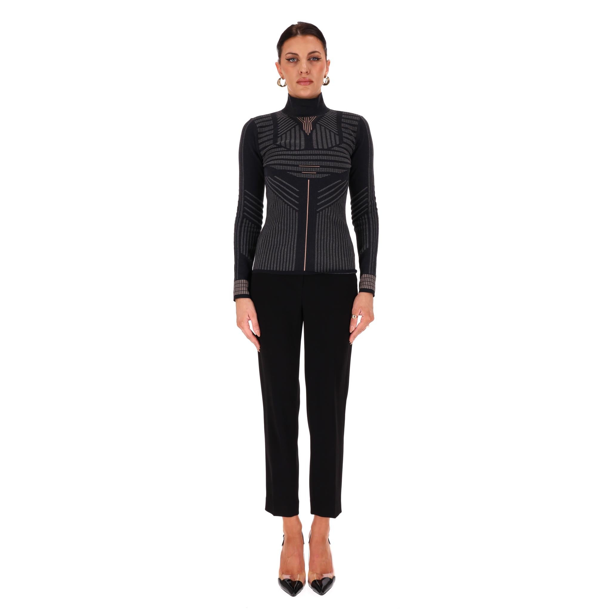 Prada Geometric-Pattern Turtleneck Fitted Top

Black top crafted in a fitted silhouette with geometric pattern in grey and light pink.

Featuring high neck, long sleeves and concealed zip fastening to rear.

Rrp Approx. £1,300

Size –