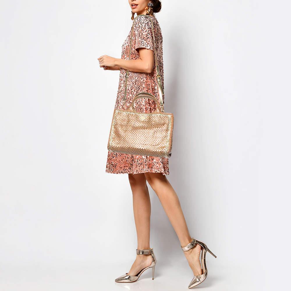 Prada ensures you have a wonderful accessory to accompany you every day with this well crafted tote. It has a signature look and a practical size.