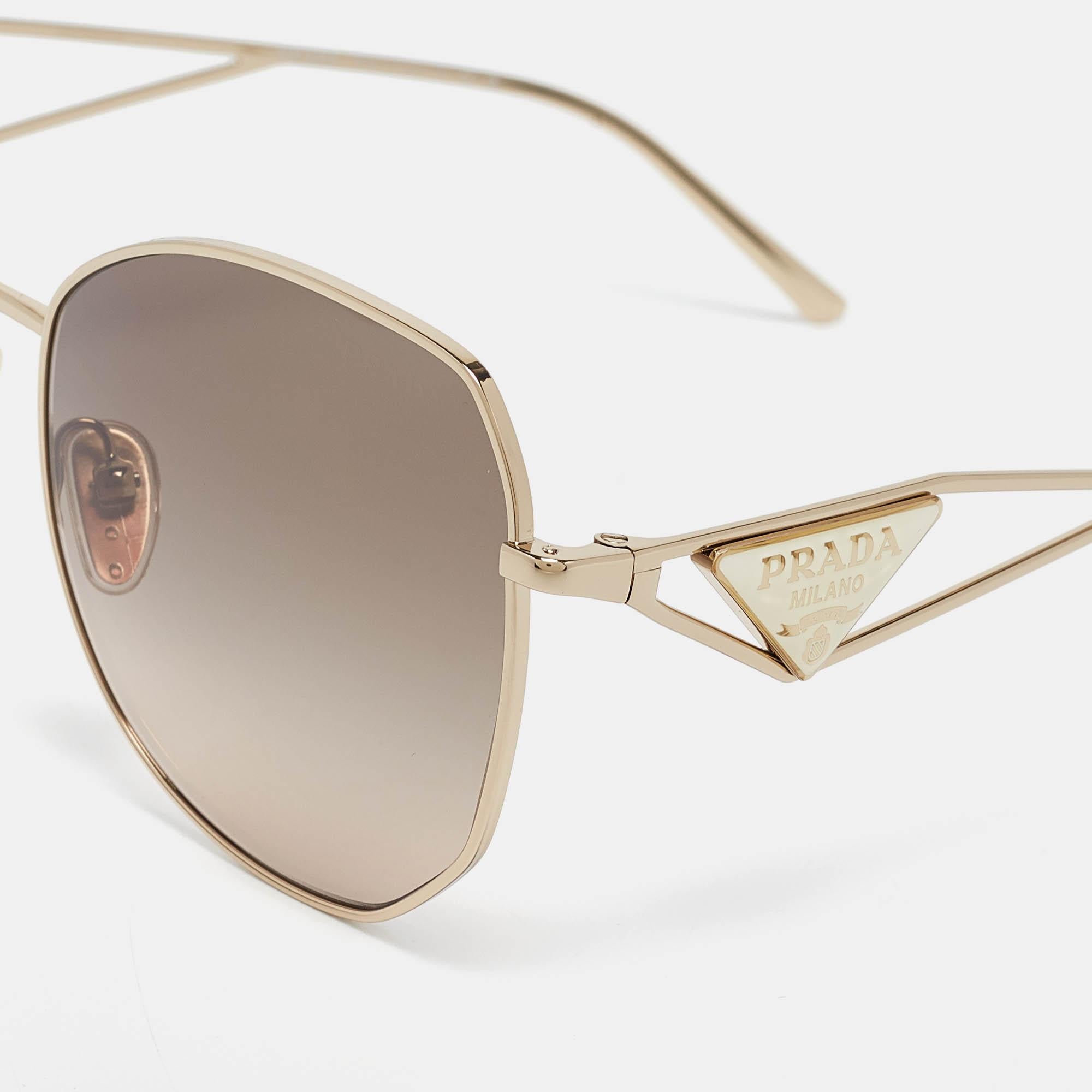 Embrace sunny days in full style with help from this pair of sunglasses by Prada. Created with expertise the luxe sunglasses feature a well designed frame and high grade lenses that are equipped to protect your eyes.