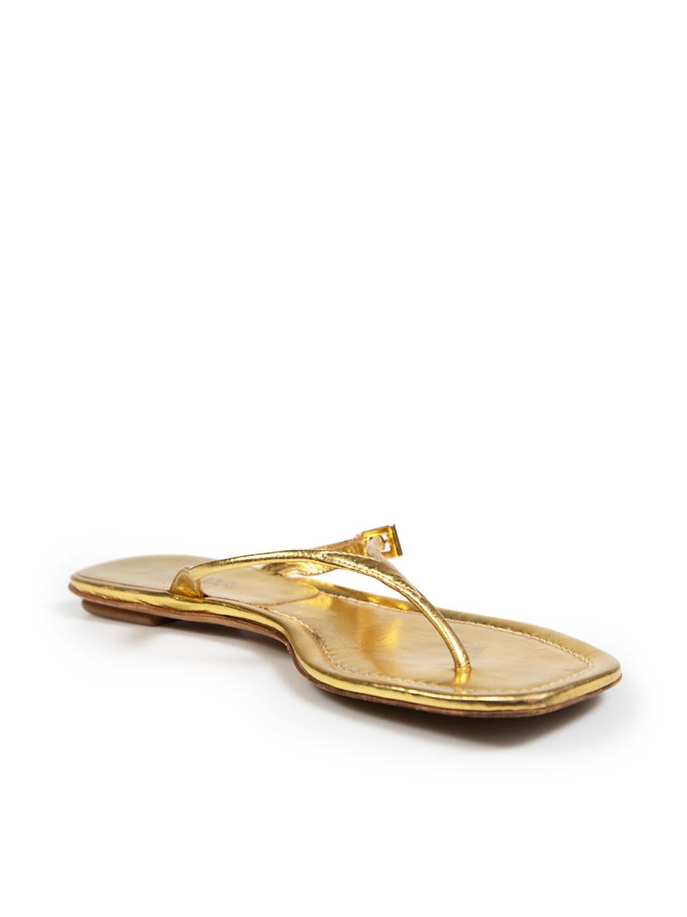 CONDITION is Good. Minor wear to sandals is evident. There are abrasions to the leather on the front and rear of the inner sole on this used Prada designer resale item.
 
 Details
 Gold
 Leather
 Sandals
 Thong straps
 Open toe
 Flat heel
 
 
 Made