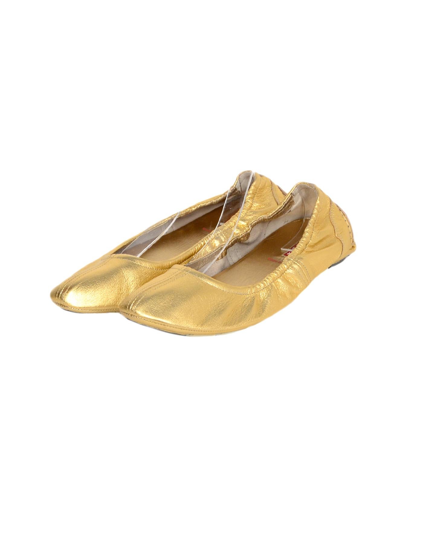 prada gold flats