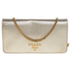 Prada Gold Textured Leather Flap Chain Clutch at 1stDibs