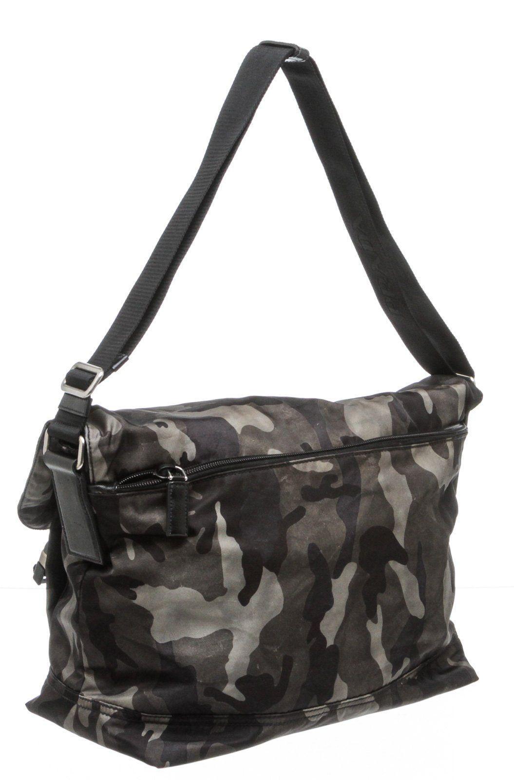 Gray green navy black camouflage print Tessuto nylon Prada messenger bag with brushed silver-tone hardware, black Saffiano leather trim, adjustable flat shoulder strap, exterior zip pocket at back, logo placard at side, dual slit pockets at flap