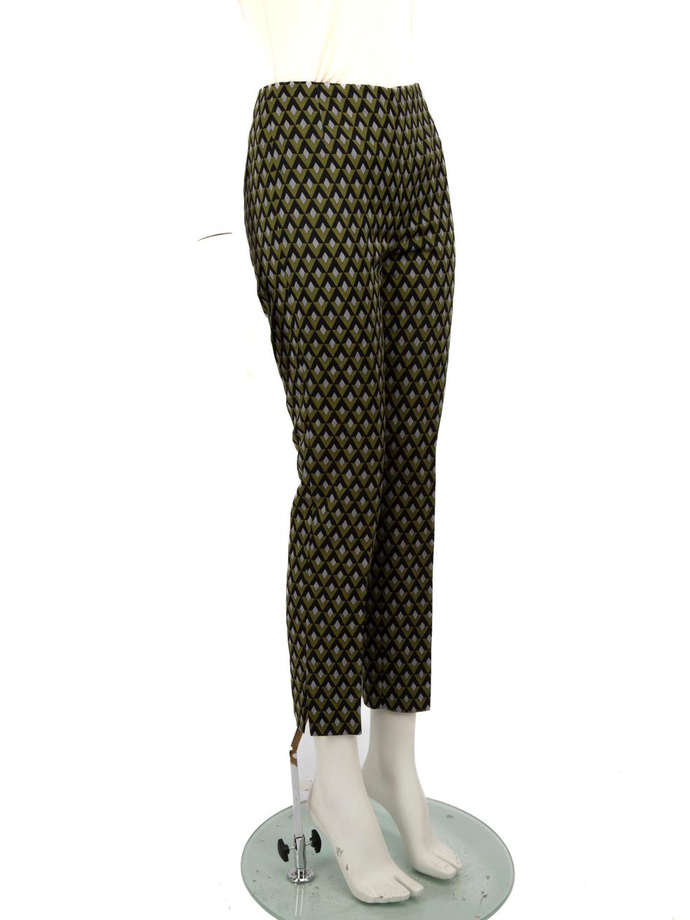 CONDITION is Very good. Hardly any visible wear to trousers is evident on this used Prada designer resale item.
 
 
 
 Details
 
 
 Green
 
 Wool
 
 Trousers
 
 Abstract pattern
 
 Slim fit
 
 Mid rise
 
 Side zip and hook fastening
 
 
 
 
 
 Made