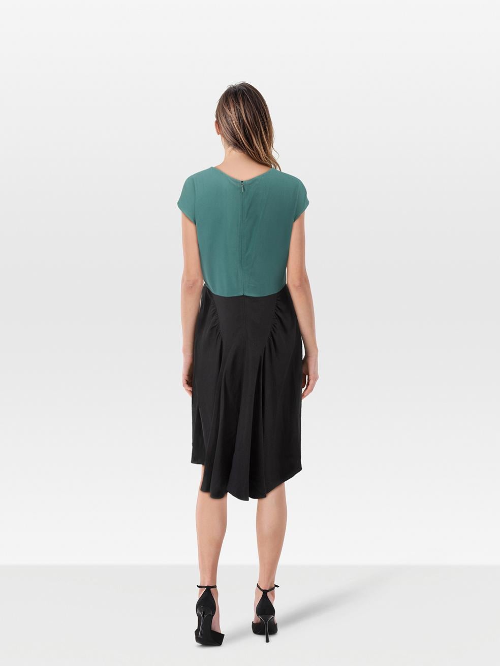 CONDITION is Very good. Minimal wear to the dress is evident. Loose back neck designer label which has created plucks to the weave. Loose stitching holding down the right arm hole. Pluck to the weave on the lower front left on this used Prada