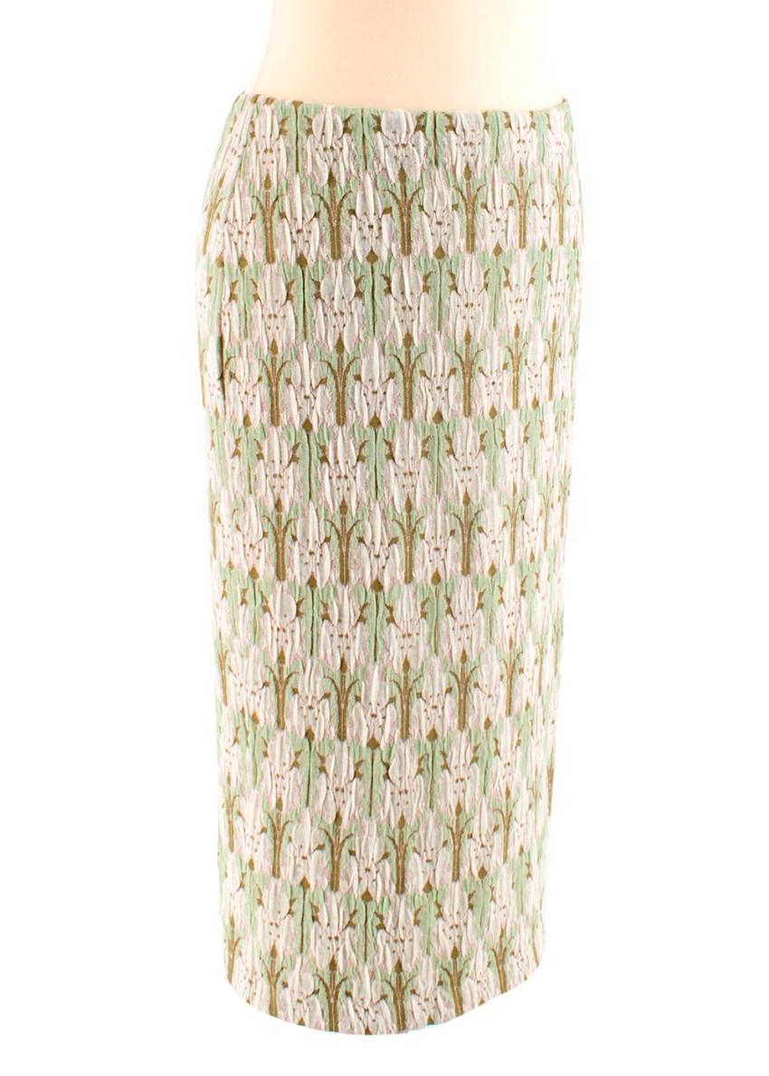 Prada Mid-length floral style green Skirt 

- Cotton Silk blend
- Textured floral pattern 
- stretch material 
- Moss green internal waistband 
- No pockets 
- Size Small

Materials
- 42% Cotton
- 26% Silk
- 1% Elastane 

Made in Italy 

Please