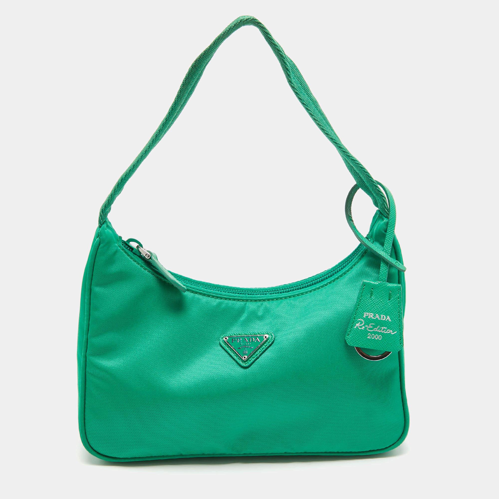 Ensure your day's essentials are in order and your outfit is complete with this Prada green bag. Crafted using the best materials, the bag carries the maison's signature of artful craftsmanship and enduring appeal.

Includes: Brand Dustbag

