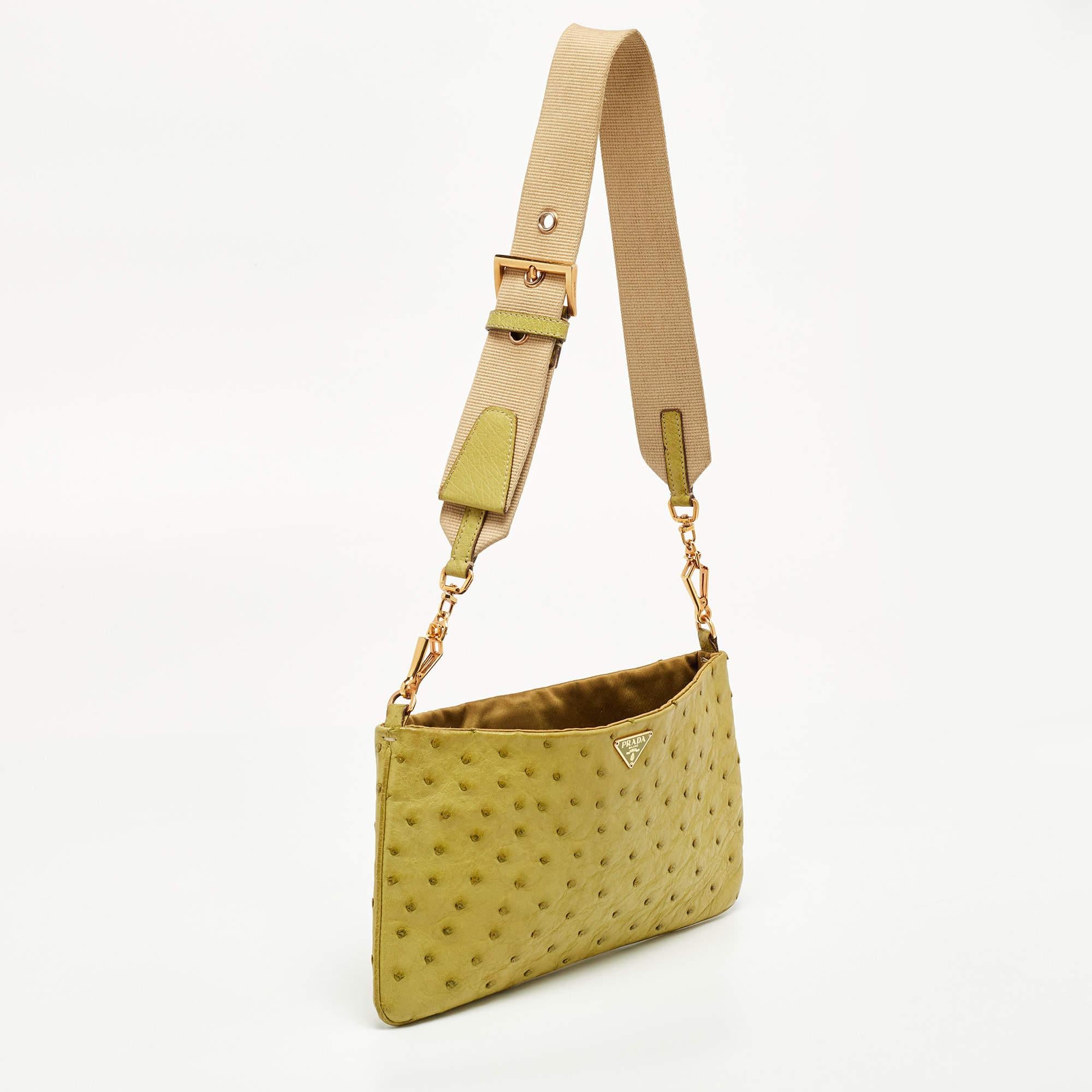 Thoughtful details, high quality, and everyday convenience mark this shoulder bag for women by Prada. The bag is sewn with skill to deliver a refined look and an impeccable finish.

