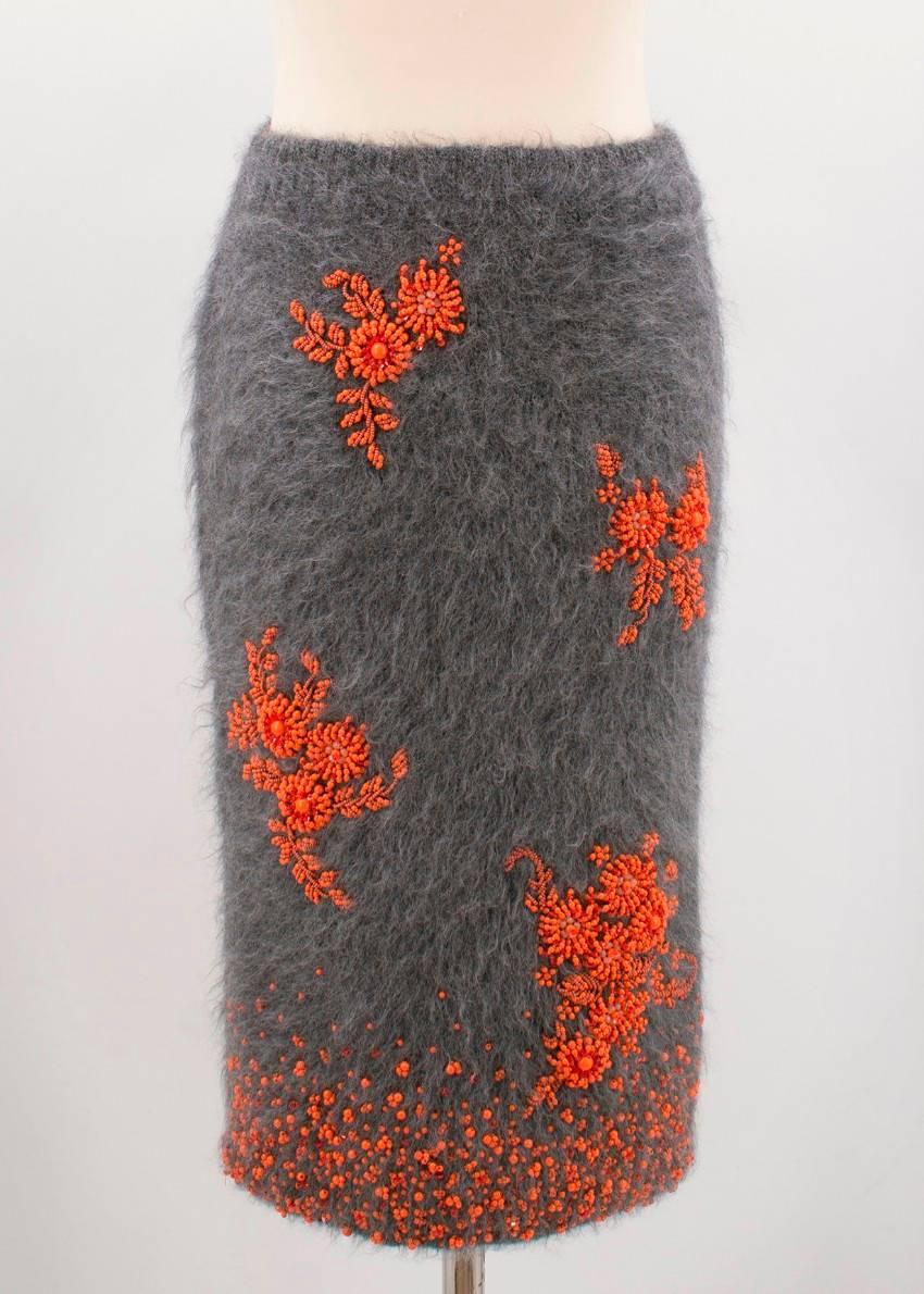Prada grey mohair blend skirt

- A/W17
- runway piece
- elasticated waistband
- Orange floral beading embellishment
- Silk lining
- Medium weight skirt
- Comes packed in Prada box 

Size:
XXXS
IT 36
US 00
UK 4

Condition: 9.5/10

Approx.