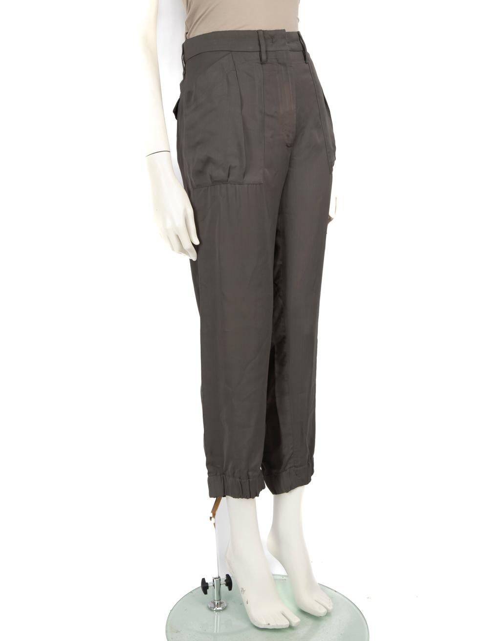 CONDITION is Good. General wear to the trousers is evident. Plucks to the weave below the waist on the front and back, front right ankle cuff, next to the fly, on the left knee and left and right side seams. Discolouration on both front knees and
