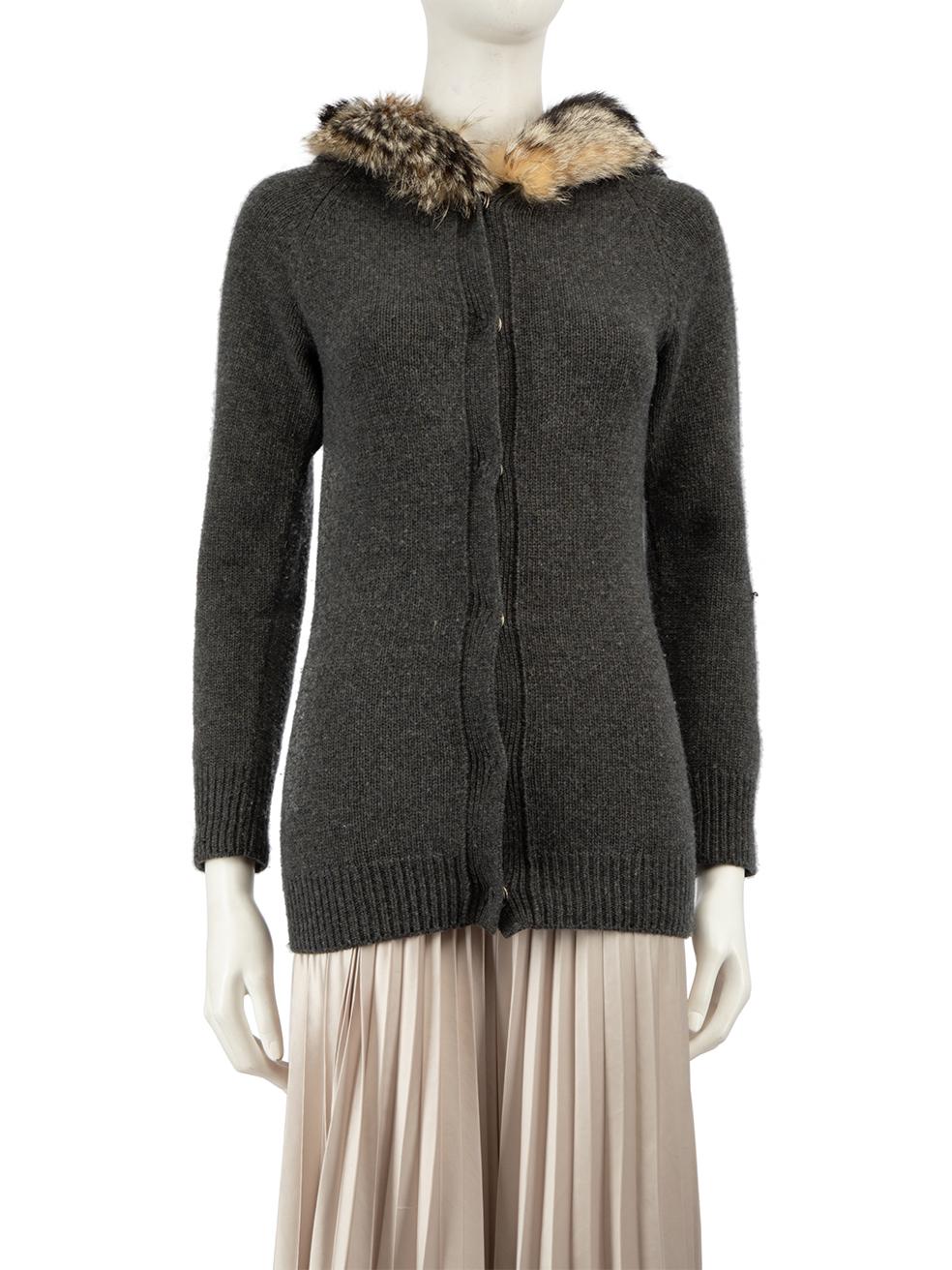 CONDITION is Very good. Hardly any visible wear to knit is evident on this used Prada designer resale item.
 
 
 
 Details
 
 
 Grey
 
 Wool
 
 Knit cardigan
 
 Hooded
 
 Fox fur trim
 
 Long sleeves
 
 Snap button fastening
 
 
 
 
 
 Made in