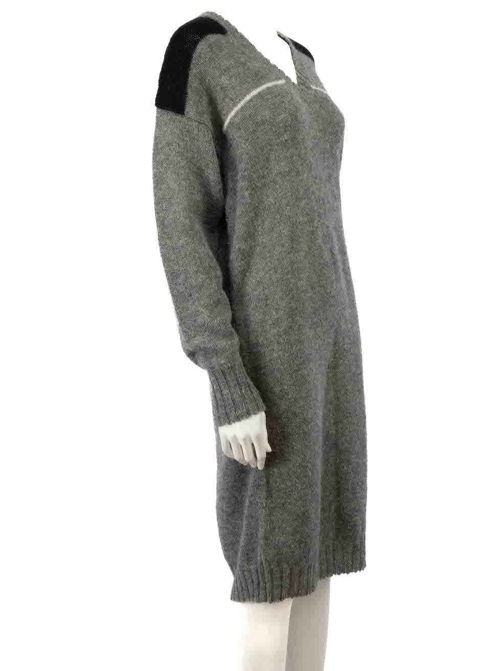 CONDITION is Very good. Minimal wear to dress is evident. Minimal wear to the embroidered logo with discolouration on this used Prada designer resale item.
 
 Details
 Grey
 Wool
 Sweater dress
 Long sleeves
 V neckline
 Knitted and stretchy
 Logo