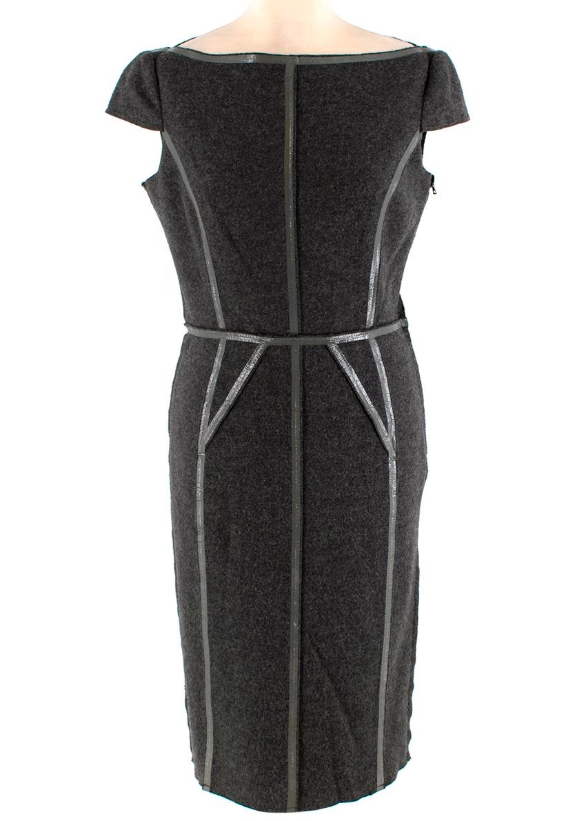 Prada Grey Wool Coating Details Dress & Blazer Jacket

-Made of soft wool 
-Classic cut 
-Gorgeous shiny coating details to the seams 

Jacket:
-Concealed snap button fastening to the front 
-Partially lined 
-Pockets to the front 

Dress:
-Boat