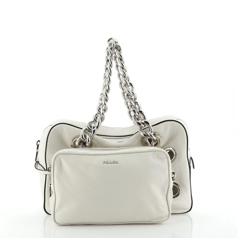 Estimated Retail Price: $3,180
Condition: Very good. Moderate creasing on exterior, small glue stains on front, creasing, discoloration and wear in interior. Creasing and wear on pochette, scratches on hardware. 
Accessories: Pochette 
Measurements: