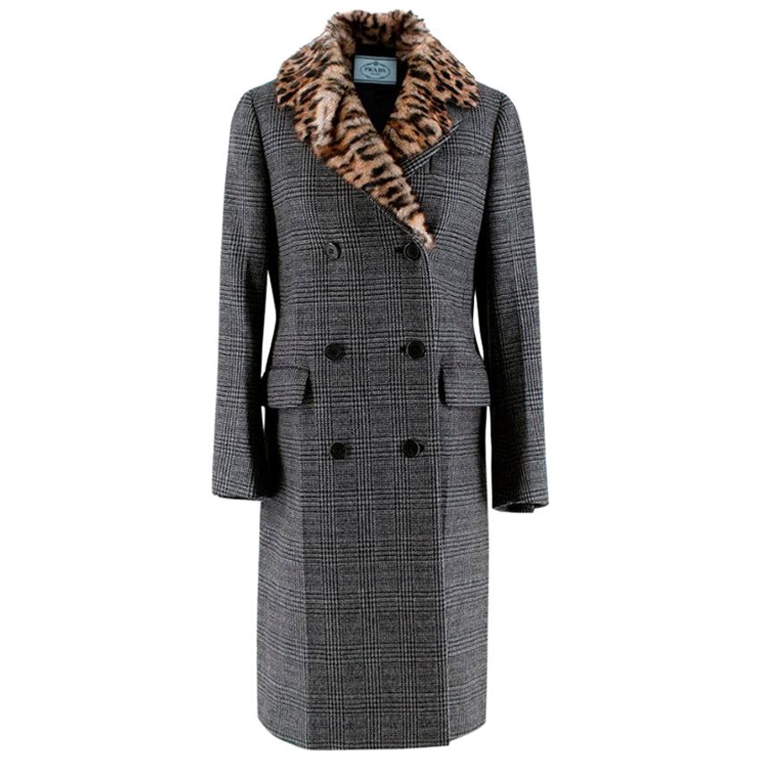 Prada Dogtooth Check Fur Collared Double Breasted Coat

- Heavyweight soft wool design 
- Double breasted long-line coat and double lapels
- Marmot fur leopard print collar 
- Dogstooth check 
- Front false welt pockets 
- Black patent front buttons