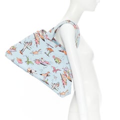 PRADA Iconic Surfer print blue canvas triangle logo seal tote bag