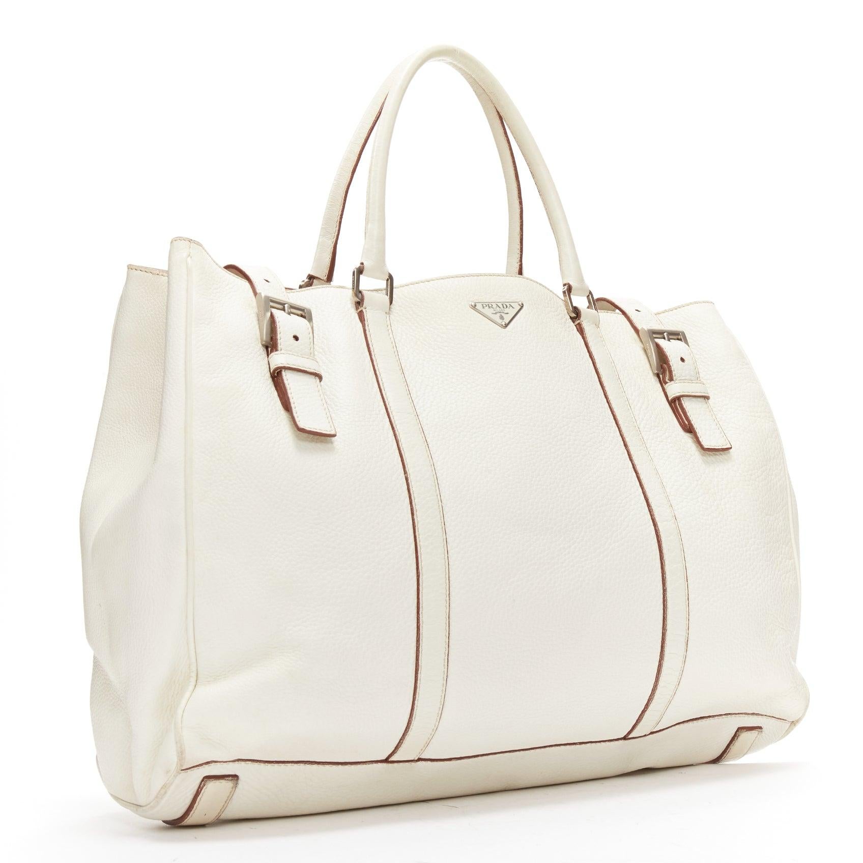 PRADA ivory white grained leather silver triangle logo buckle strap tote bag In Fair Condition For Sale In Hong Kong, NT