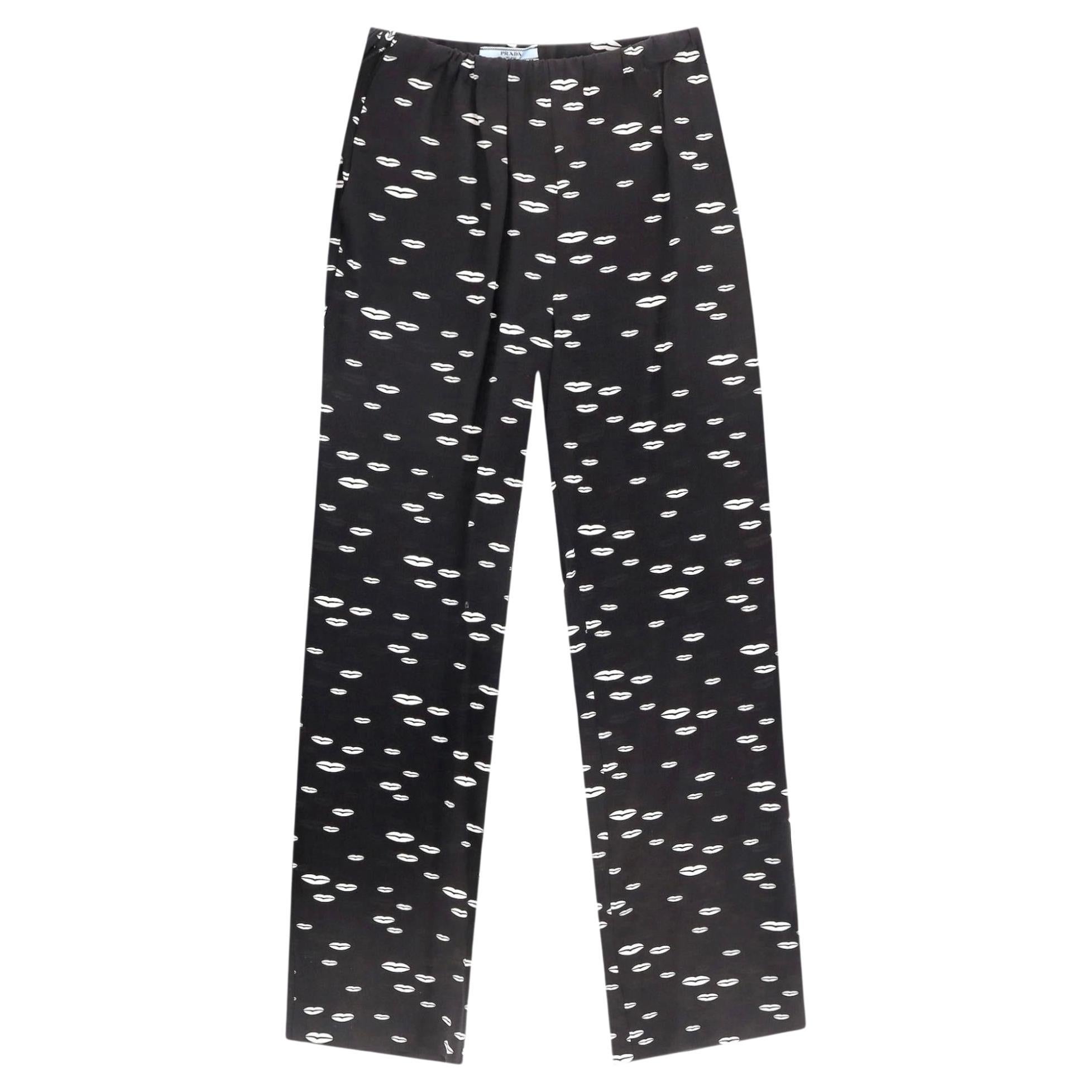 Prada Pantaloni in seta con stampa Kiss